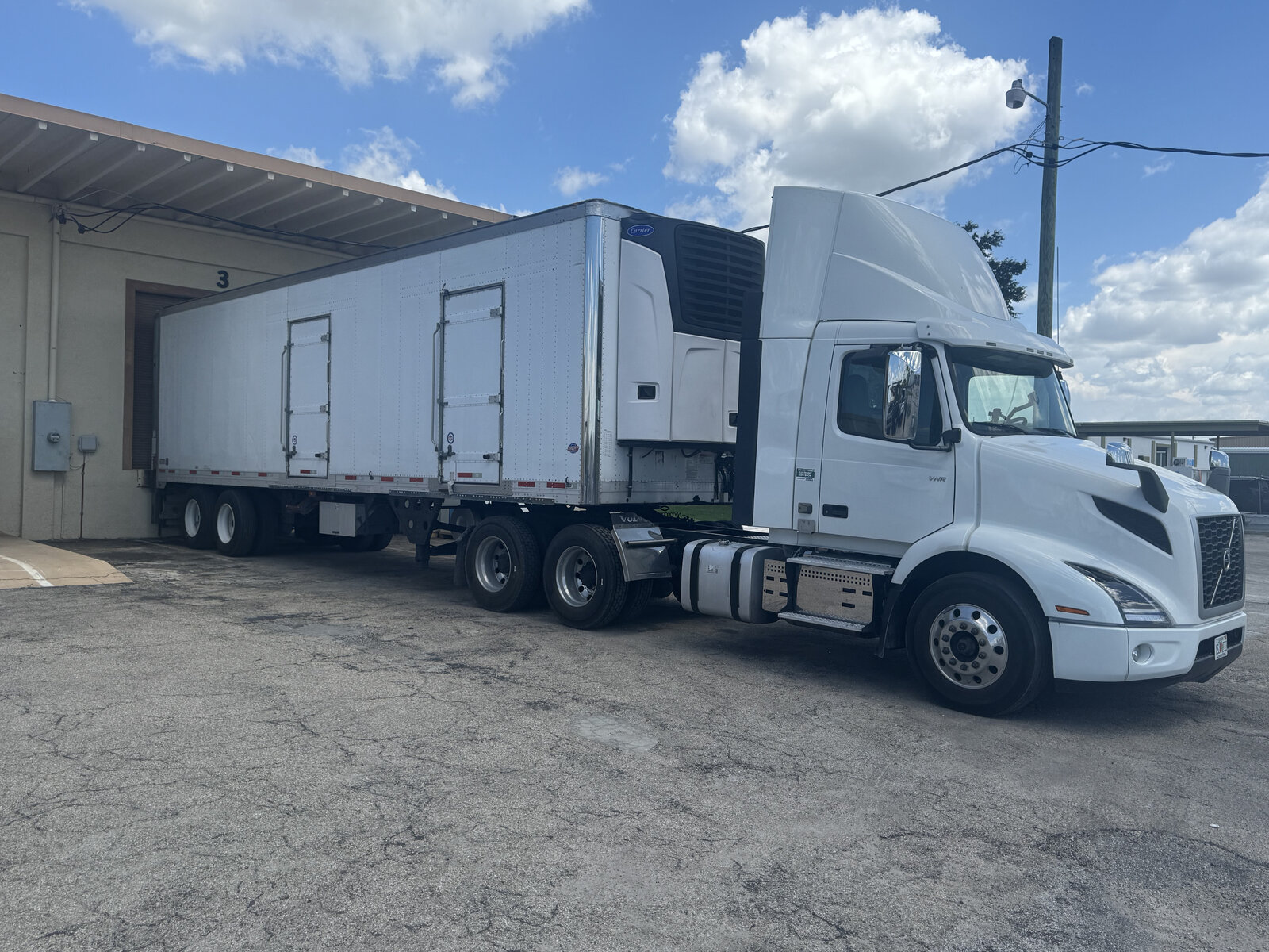 Southern Ice & Water refrigerated delivery truck at the loading dock